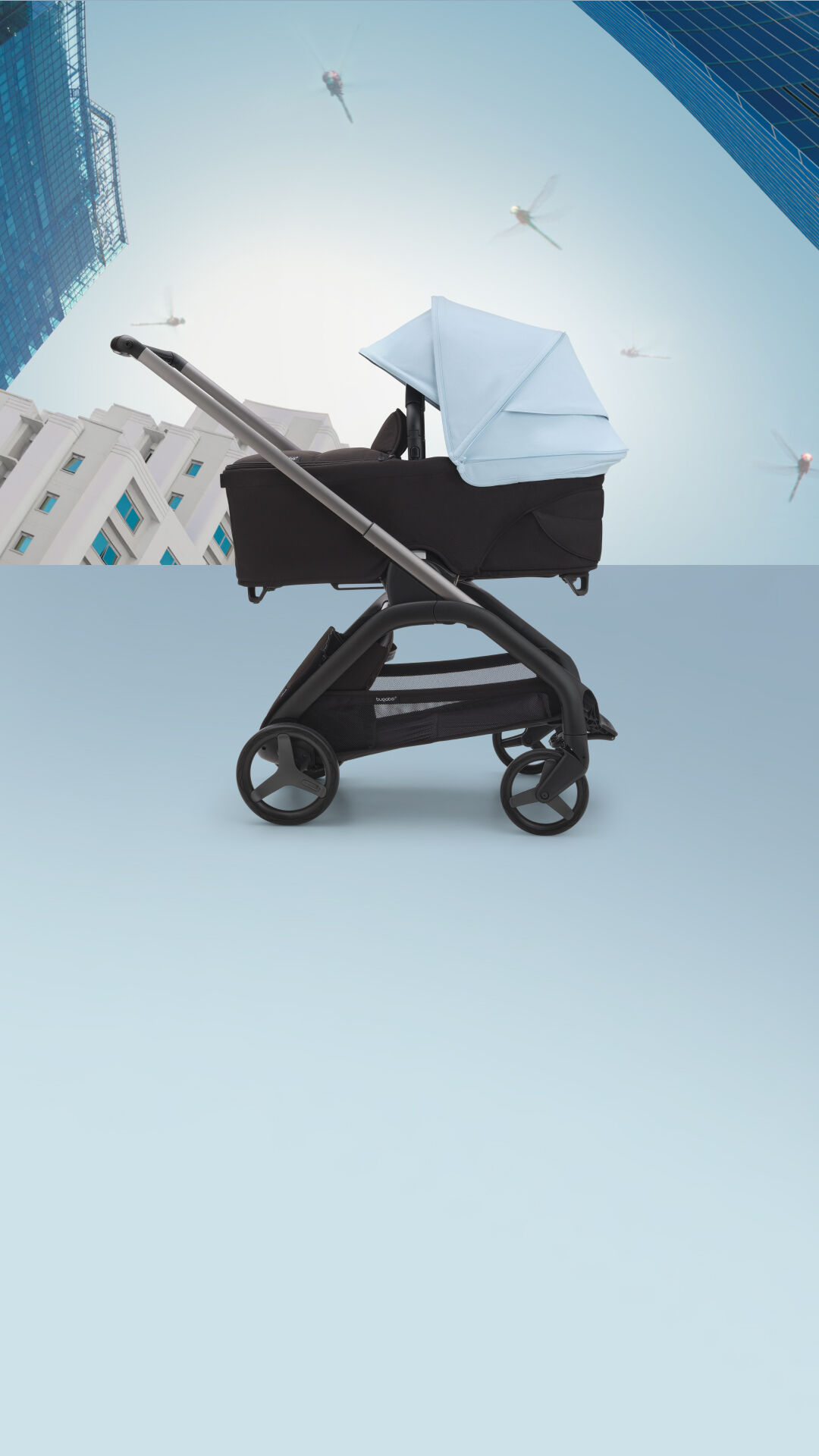 Bugaboo Dragonfly stroller with bassinet and Skyline blue sun canopy.